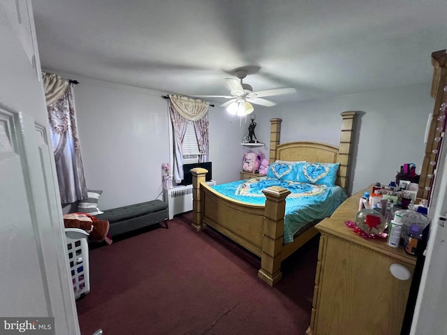 carpeted bedroom featuring ceiling fan and radiator heating unit