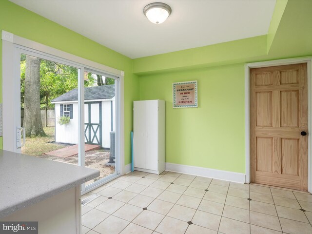 interior space featuring light tile patterned flooring