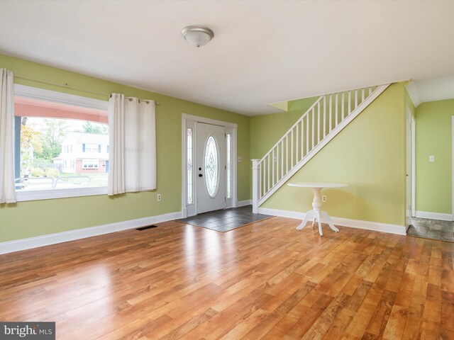 entrance foyer featuring light hardwood / wood-style floors