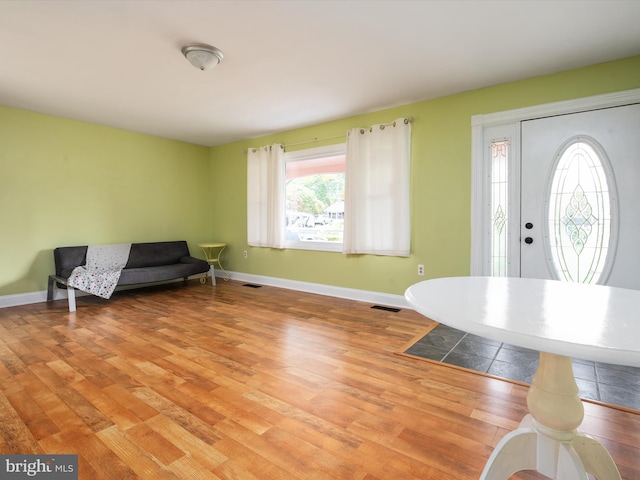 foyer with light hardwood / wood-style flooring