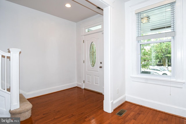 entrance foyer featuring dark hardwood / wood-style flooring