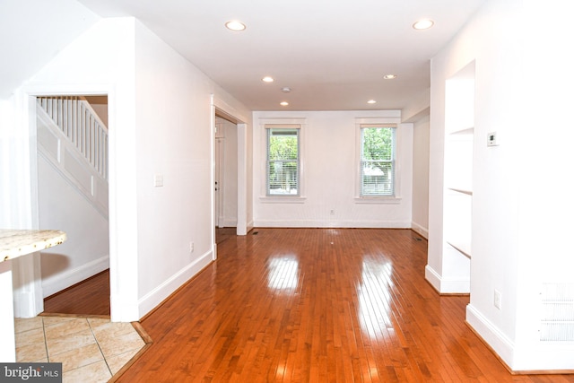 spare room featuring hardwood / wood-style floors