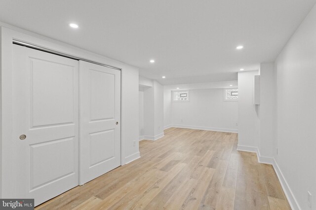 corridor featuring light hardwood / wood-style floors