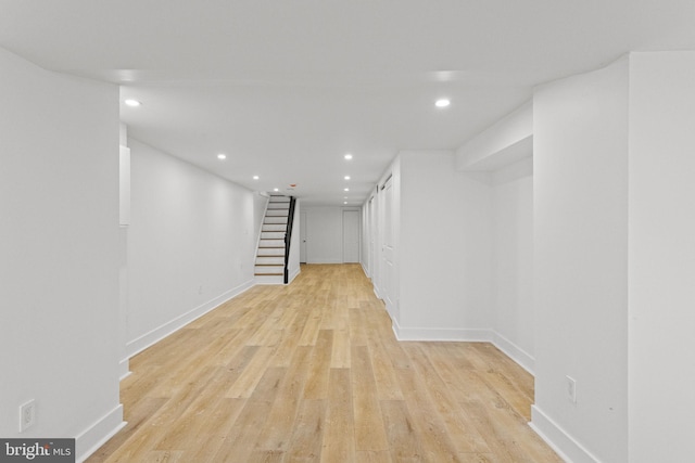 basement featuring light hardwood / wood-style floors