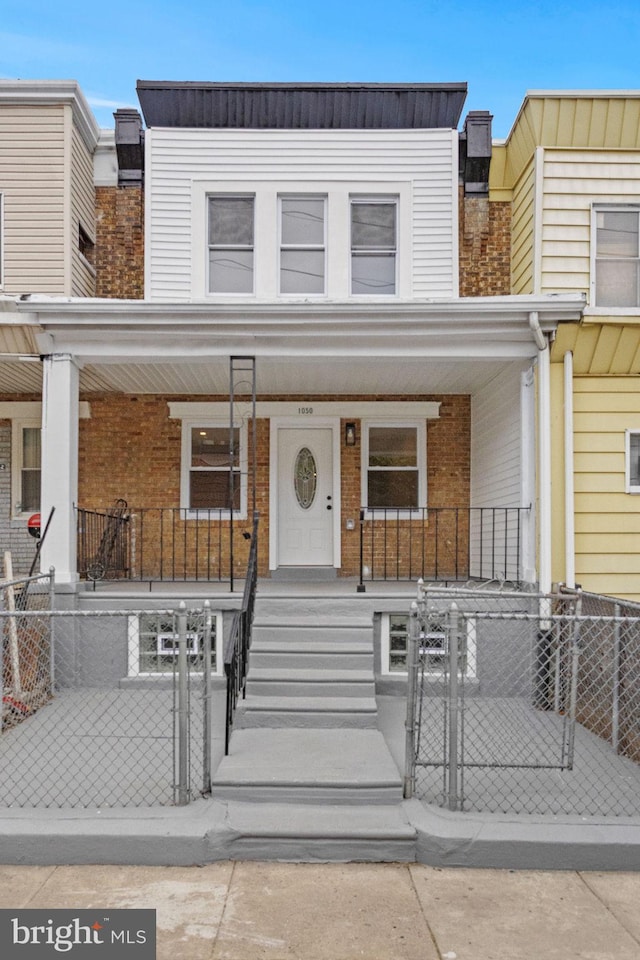 multi unit property featuring covered porch