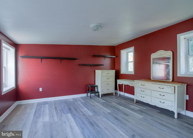 unfurnished bedroom with light hardwood / wood-style flooring