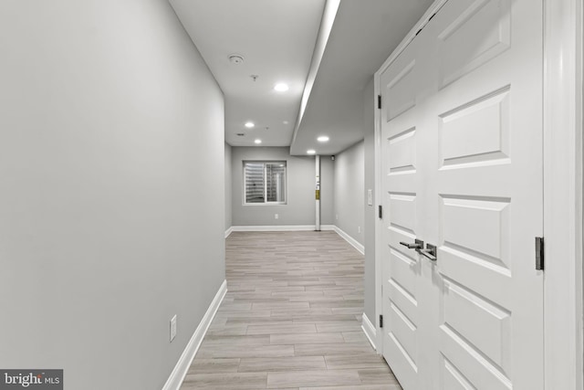 corridor featuring light wood-type flooring