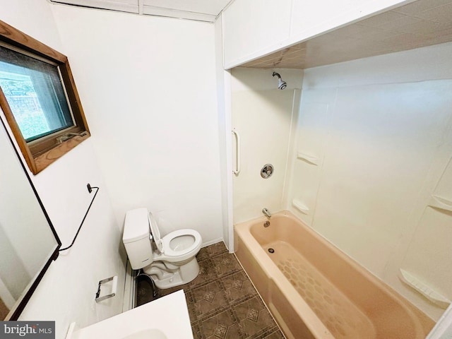 bathroom with toilet and washtub / shower combination