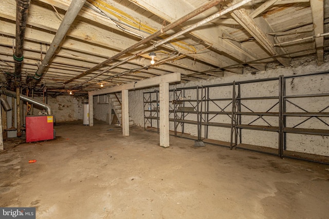 basement with heating unit and water heater