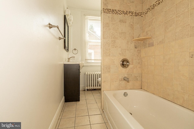 bathroom with radiator heating unit, vanity, tiled shower / bath combo, and tile patterned flooring