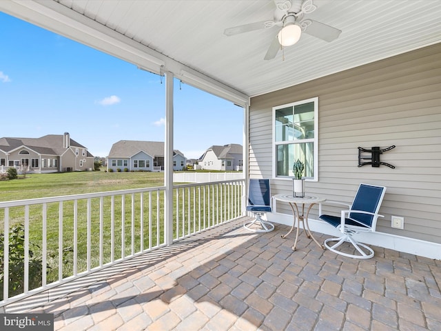 view of patio / terrace featuring ceiling fan