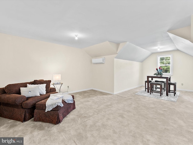 living area with lofted ceiling, light carpet, and a wall mounted air conditioner