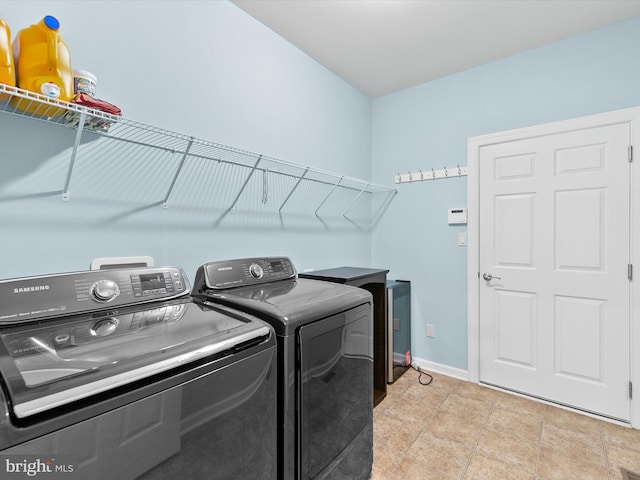 washroom with washer and clothes dryer