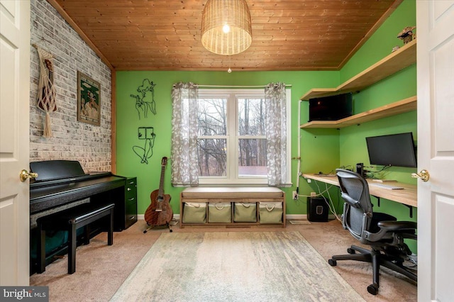 carpeted office space featuring wood ceiling, brick wall, and vaulted ceiling