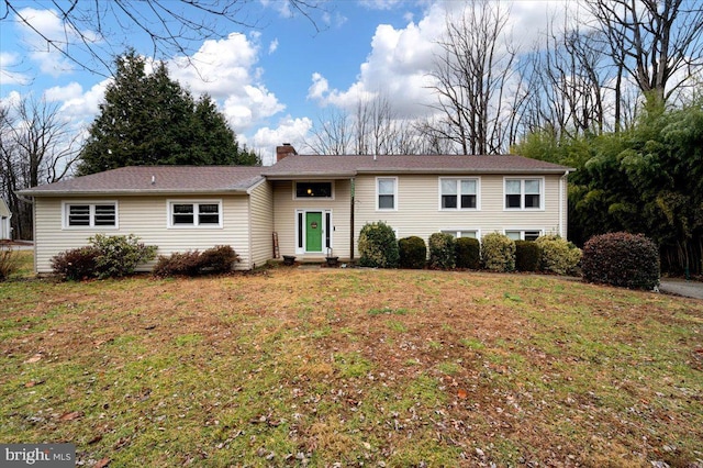 view of front of home with a front yard