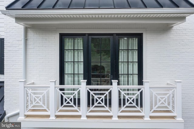 doorway to property featuring french doors