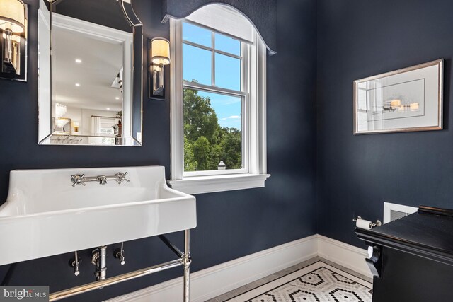 bathroom featuring tile patterned flooring