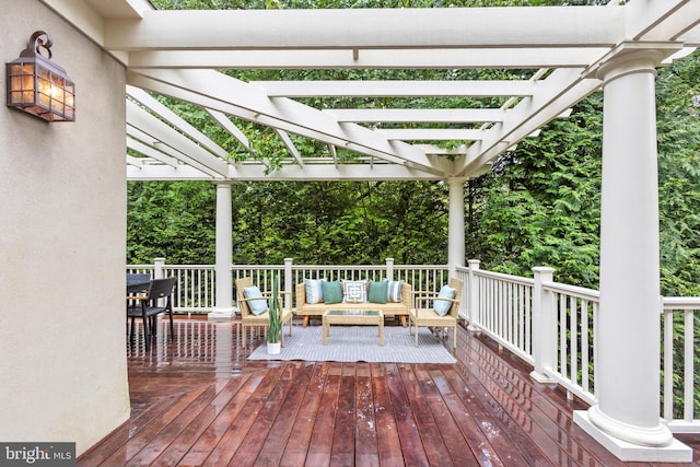 wooden deck featuring outdoor lounge area and a pergola