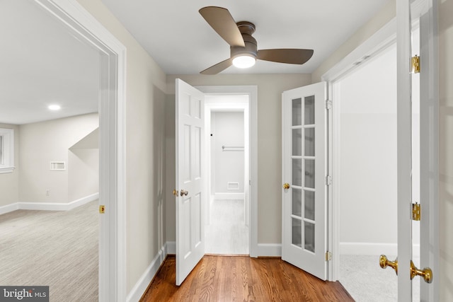 interior space with light hardwood / wood-style flooring and french doors