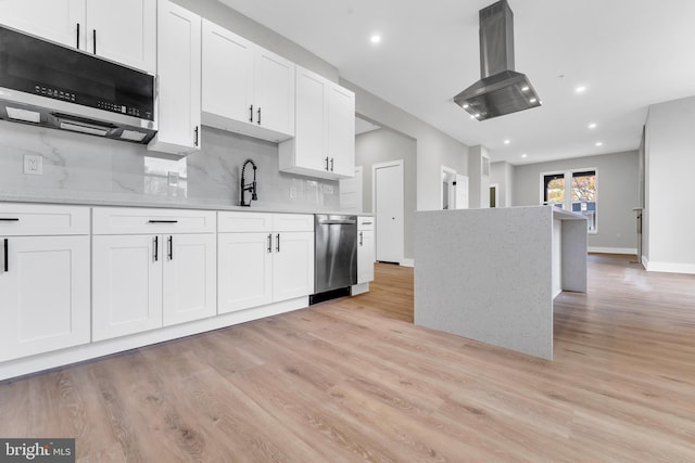 kitchen featuring island exhaust hood, white cabinetry, stainless steel appliances, and light wood-type flooring