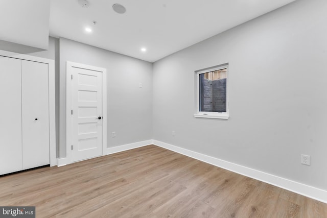 unfurnished bedroom featuring light hardwood / wood-style floors