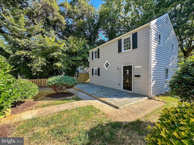 rear view of property with a patio area