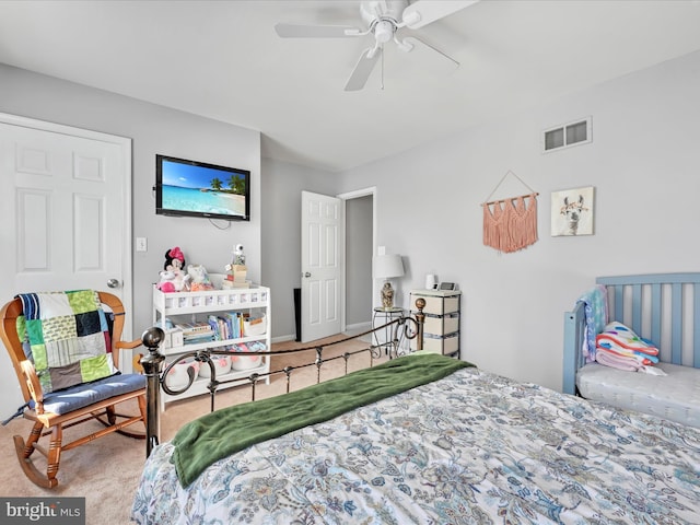 bedroom with ceiling fan and carpet flooring