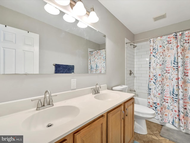 full bathroom with shower / bath combo with shower curtain, toilet, and vanity