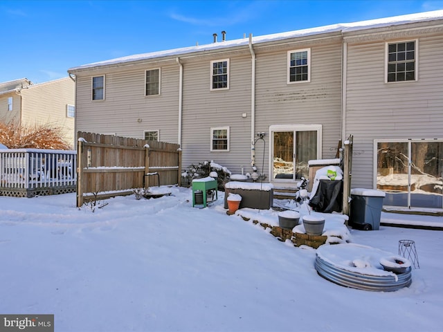 view of snow covered house