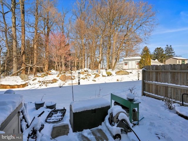 view of yard covered in snow