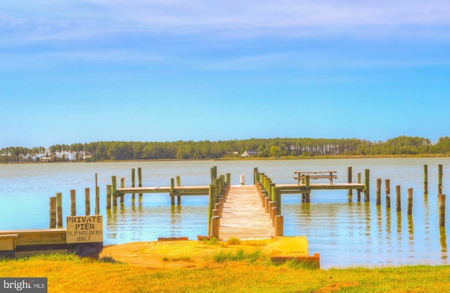 view of dock with a water view