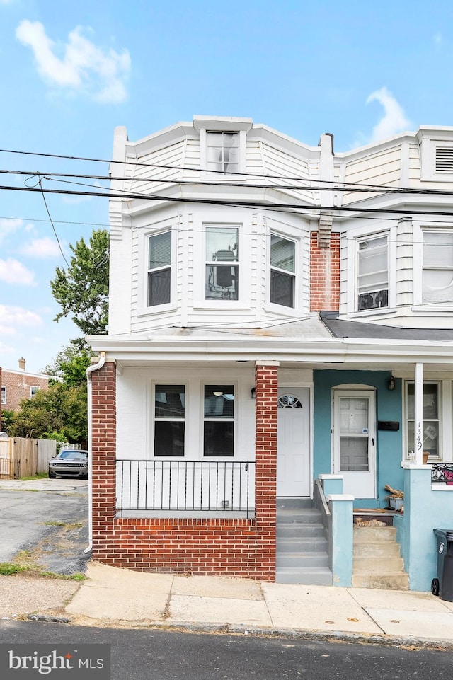 multi unit property featuring covered porch