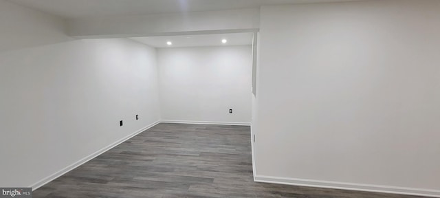 unfurnished room with hardwood / wood-style flooring