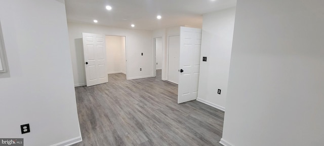 hall with light hardwood / wood-style floors