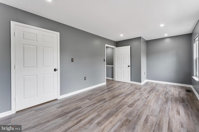 unfurnished bedroom featuring light hardwood / wood-style flooring