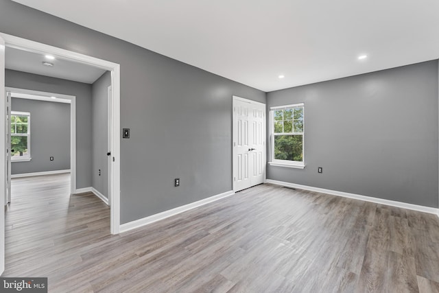 interior space featuring light hardwood / wood-style flooring and plenty of natural light