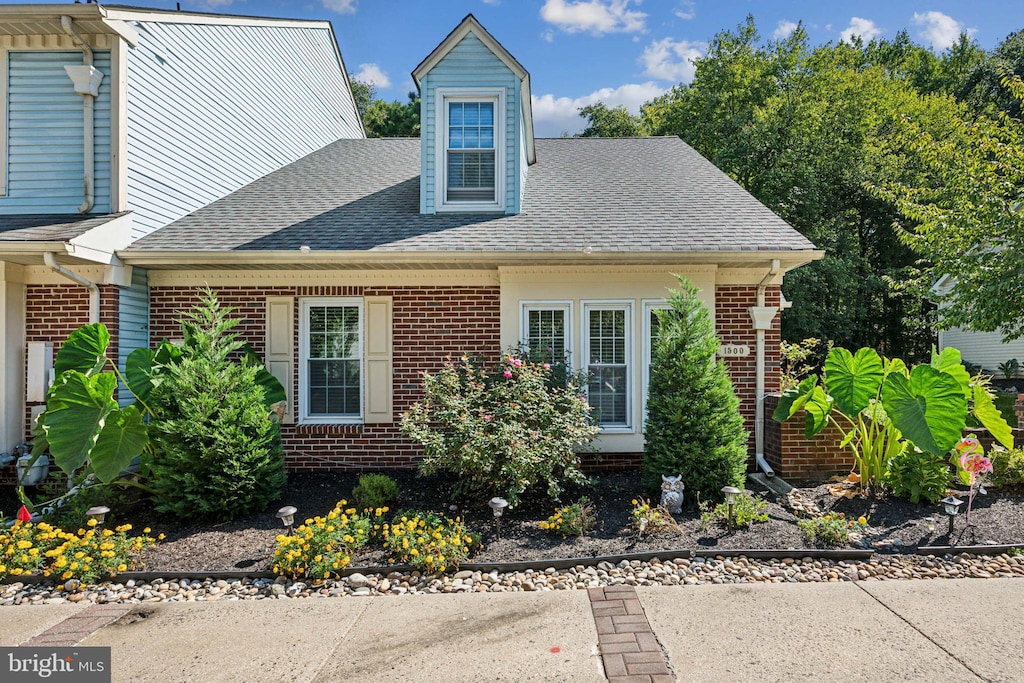 view of new england style home