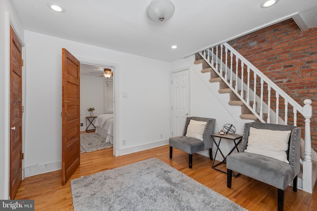 living area with light hardwood / wood-style floors