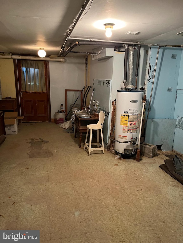 basement featuring gas water heater