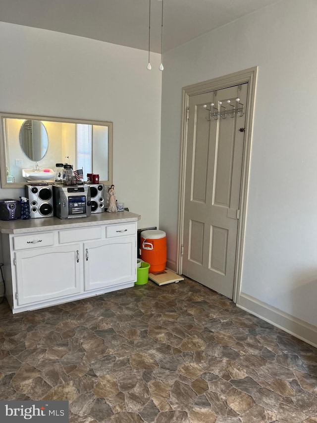 kitchen with white cabinets