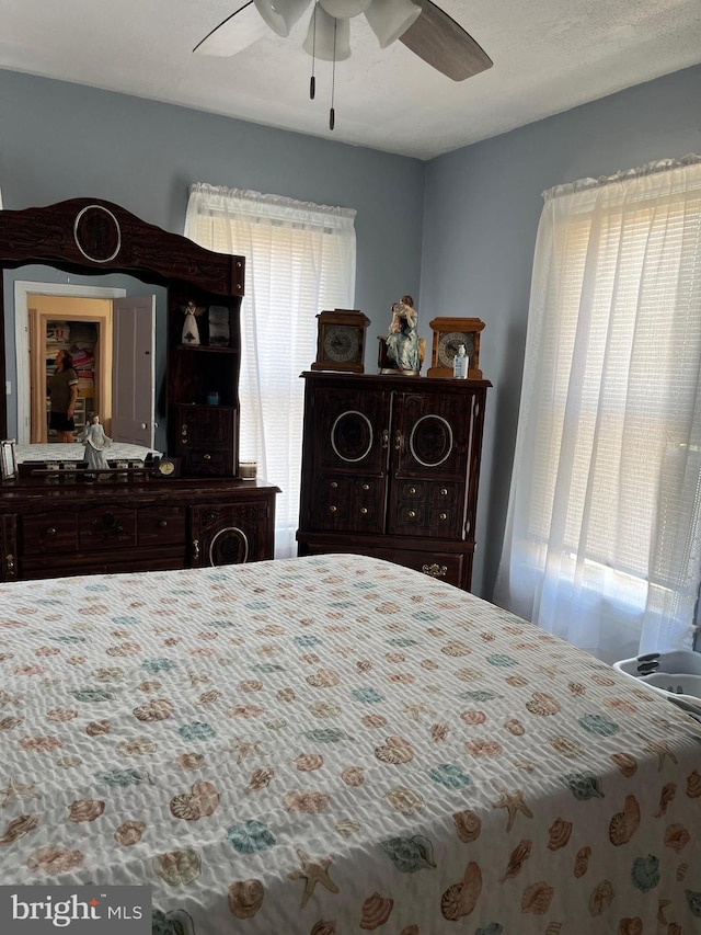 bedroom featuring ceiling fan