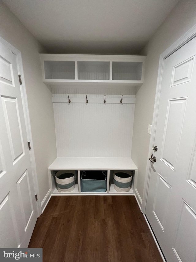 mudroom with dark hardwood / wood-style floors