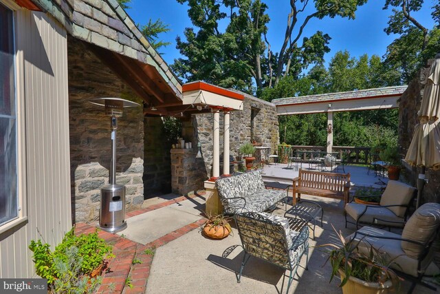 view of patio with an outdoor hangout area