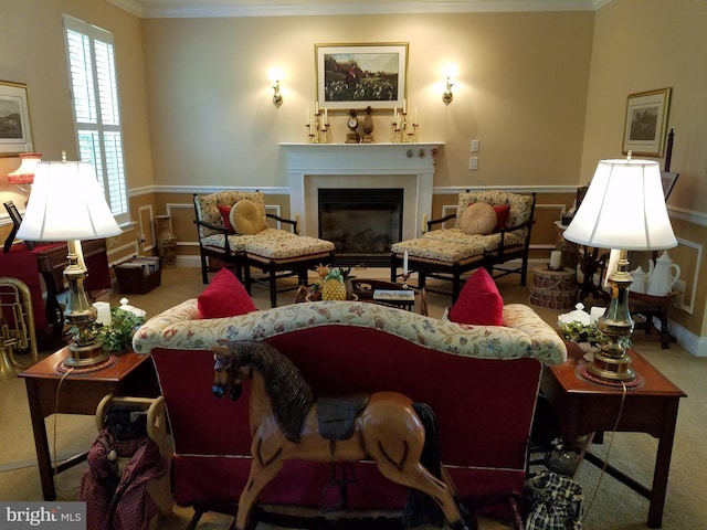 carpeted living room featuring ornamental molding