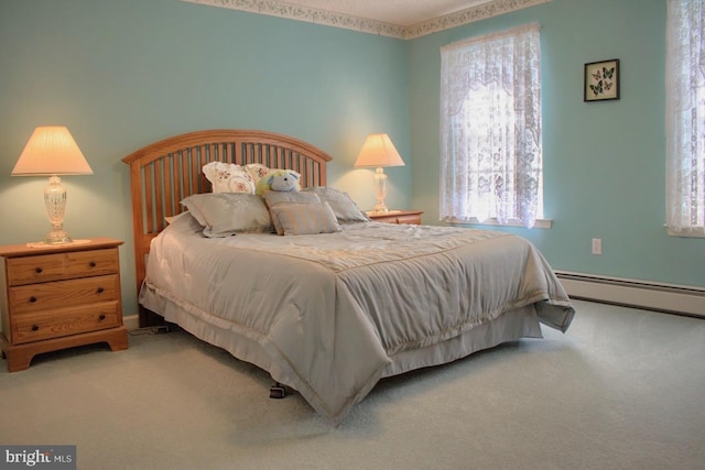 bedroom featuring multiple windows and carpet flooring