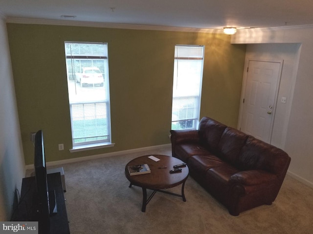 living room featuring carpet flooring and ornamental molding