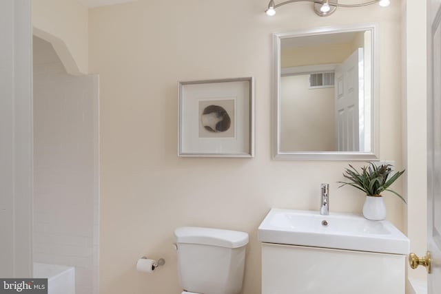 bathroom with vanity and toilet