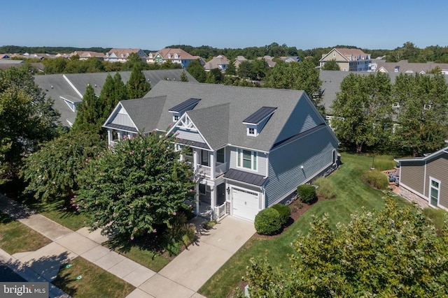 drone / aerial view with a residential view