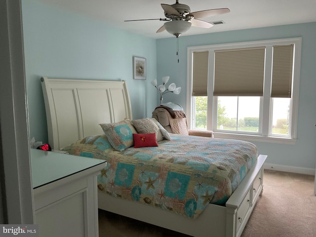 carpeted bedroom with ceiling fan