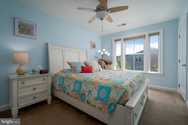 bedroom featuring visible vents, baseboards, carpet, and ceiling fan